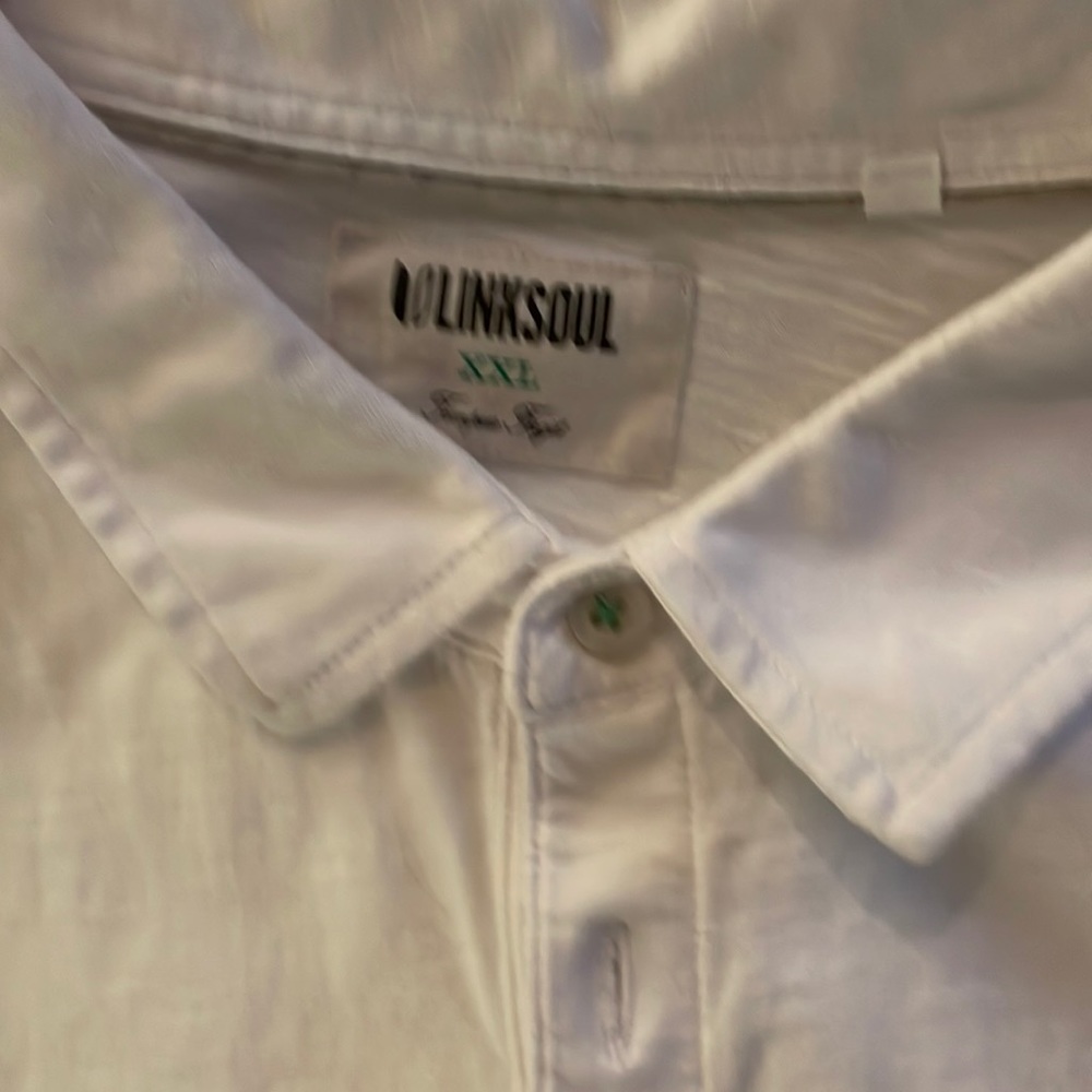 LinkSoul golf polo with Mauna Kea golf logo on left sleeve